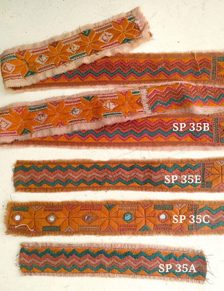 hand embroidered on cotton strips with mirrorwork