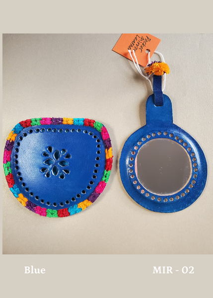hand crafted bright blue hand-cut leather pocket mirror with decorative perforations