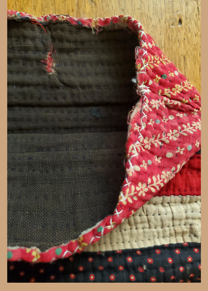 lining - closeup of gudri hand quilting on traveler's bag