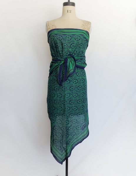 Green with blue long scarf worn as a dress or a cover up.