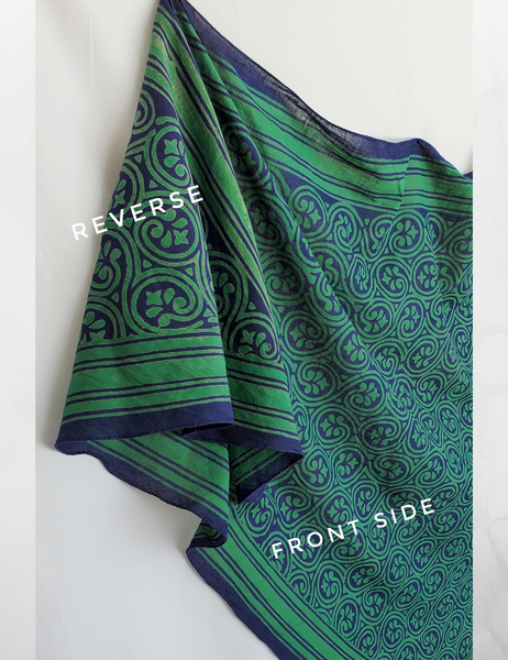 Green with blue long scarf.