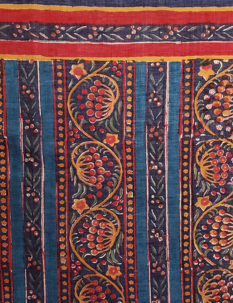 Close up of red, blue and yellow pattern.