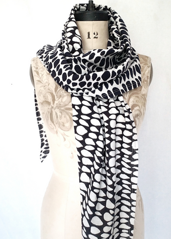 Long black butti print scarf. Colours are reversed on one side.