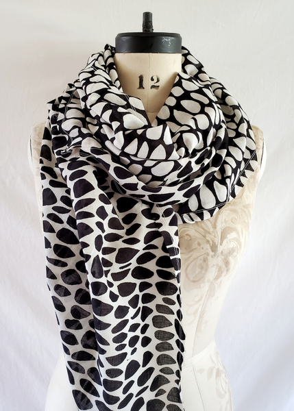 Long black butti print scarf. Colours are reversed on one side.