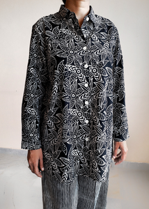 Elena cotton button up shirt with collar and long sleeves.