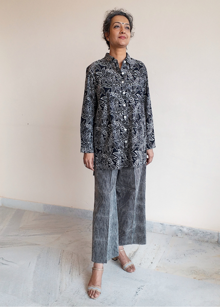 Elena cotton button up shirt with collar and long sleeves.