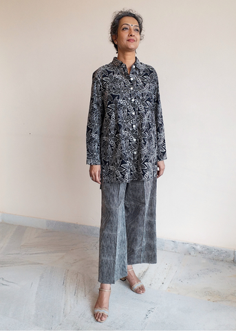 Elena cotton button up shirt with collar and long sleeves.