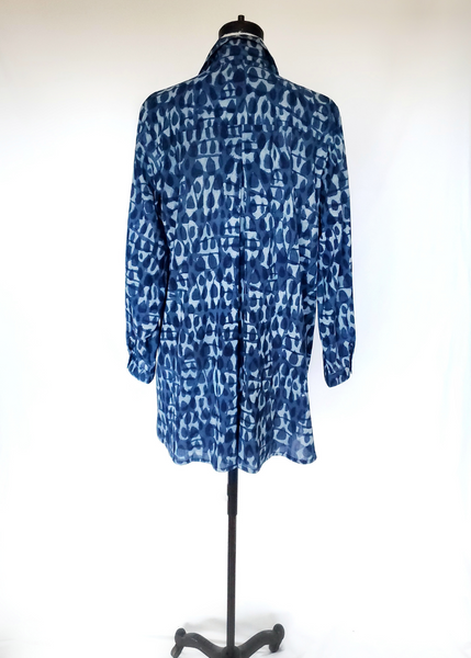 Mannequin with Elena Shirt in Indigo Basalt Print Button Up Top With Collar, Back view.