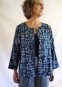 Model wearing Six Button Blouse, Unbuttoned in Indigo Basalt Pattern.