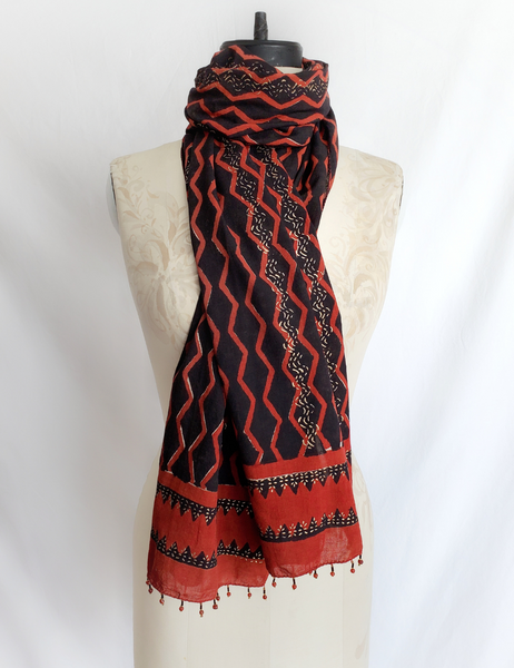 Rusty red and black long scarf with gold detailing.