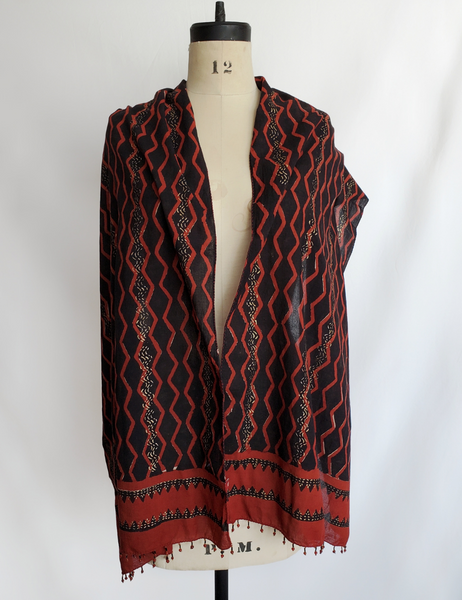 Rusty red and black long scarf with gold detailing.