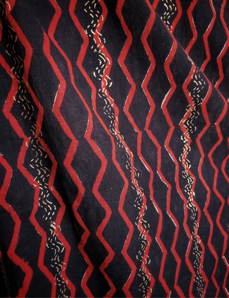 Rusty red and black long scarf with gold detailing.