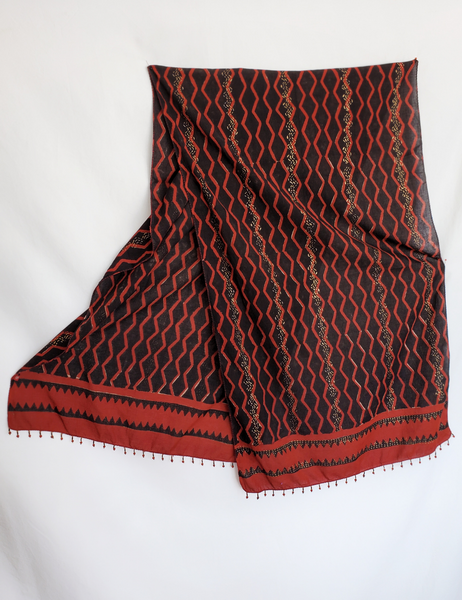 Rusty red and black long scarf with gold detailing.