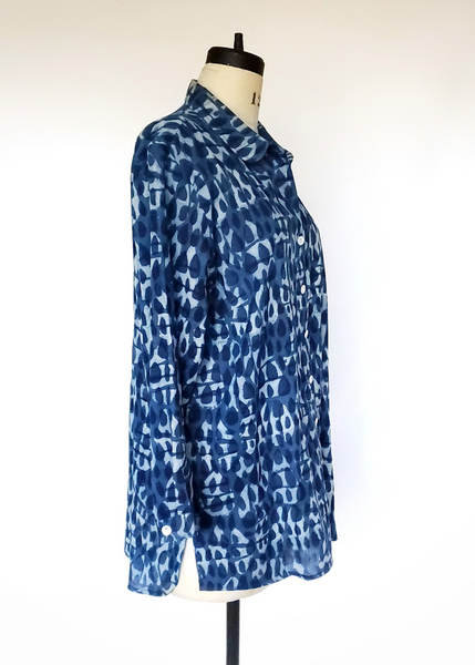 Mannequin with Elena Shirt in Indigo Basalt Print Button Up Top With Collar, Side View.