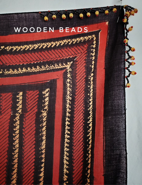 Long red and black borneo stripe scarf with wooden beads.