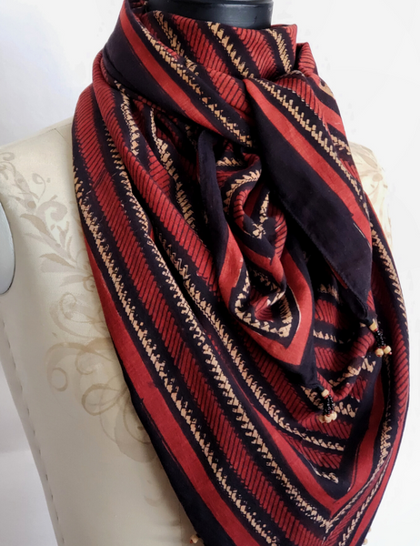 Long red and black borneo stripe scarf with wooden beads.