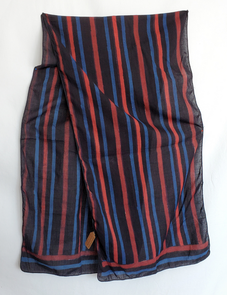 Blue, red and black striped hand block print scarf. The black stripe is the thickest and most prominent.