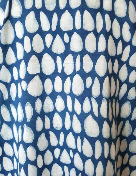 Close up of Indigo and White Butti Print Pattern. Butti print consists of small similar sized dollops of colour on a plain coloured fabric. 