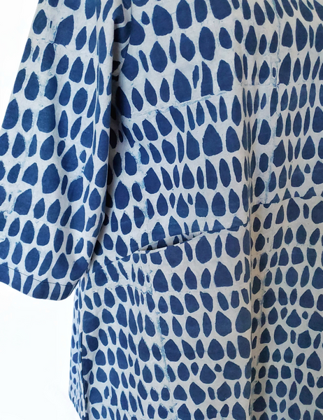 Close up of Nadine Cotton White and Indigo Dress in Butti Print on Mannequin. Half Sleeves. 