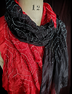 Crimson and black half and half scarf.