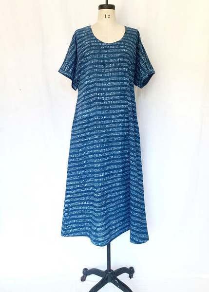 T-Shirt Style Cotton Summer Dress in Indigo and White Horizontal Stripe Print. Sits Above the Ankles.